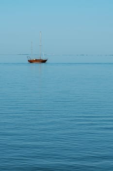 yachts on the water against the blue sky. photo