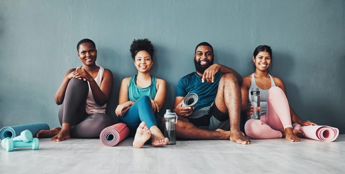 Yoga, fitness portrait and black people happy at pilates class in gym with a exercise and training break. Lounge, wellness and peace of friends on floor ready for zen, balance and relax by wall.