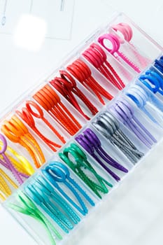 Colored elastic orthodontic bands for braces. Dentistry. Orthodontic treatment of teeth.