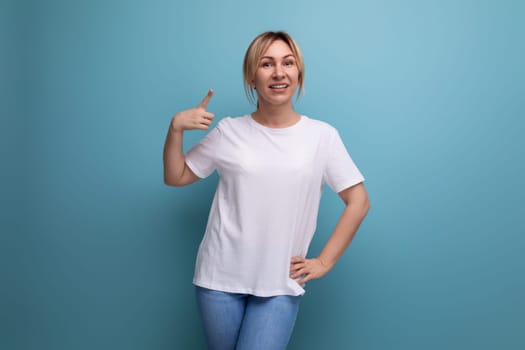 blond young lady in white tank top for business logo print on studio background with copy space.