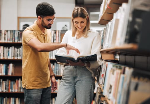 Students, library and discussion for man, woman or book for knowledge, learning or information in university. Bookshelf, conversation and reading for college student, friends or education for success.