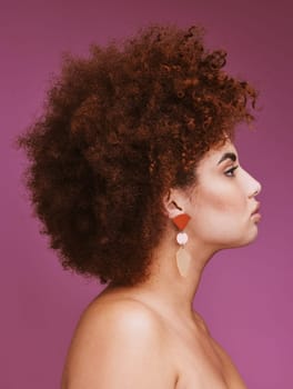 Woman, profile or afro hairstyle on isolated purple background in empowerment, curly maintenance or skincare salon promotion. Beauty model, natural or hair growth texture on cosmetics studio backdrop.