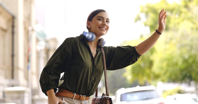 Happy, city and woman calling cab, taxi or public transport while exploring on adventure vacation. Travel, smile and young female person waving for transportation in town on holiday or weekend trip