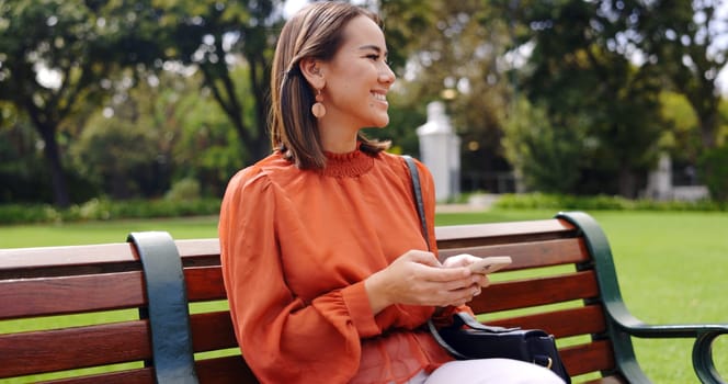 Asian woman on bench at park taking pictures for social media. technology and digital with business female in outdoors for communication