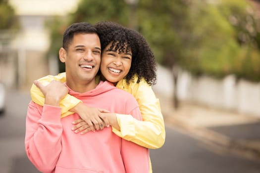 Black couple, smile and hug portrait of young people with love, care and bonding outdoor. Happy woman, man and summer fun of people on a street walking with happiness on vacation smiling together.