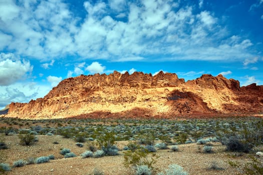 Valley of Fire is located 50 miles north of Las Vegas, Nevada.  Various shots depicting the rocky sandstone formations with some clouds and thunderstorms.