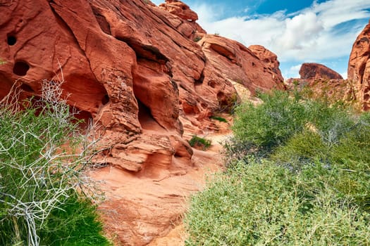 Valley of Fire is located 50 miles north of Las Vegas, Nevada.  Various shots depicting the rocky sandstone formations with some clouds and thunderstorms.