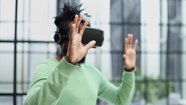 A man is looking for bright impressions using gadgets.