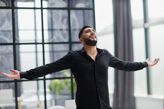 Achievement career wealth business concept. Mock up copy space. Clenching fists like winner.