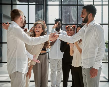 Business people shaking hands, finishing up a meeting