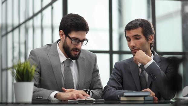 business people in the office working together.