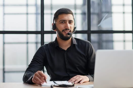 Business people wearing headset working in office broaden view