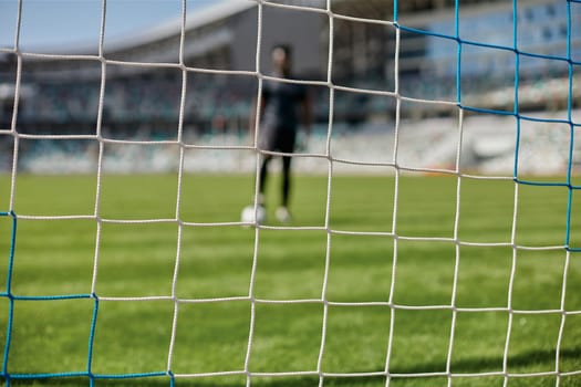 Football, soccer goal net with green grass background