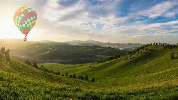 Beauty dawn on the beauty valleys, balloon, in the mountains in Altay