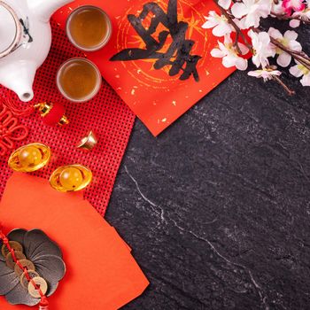 Design concept of Chinese lunar January new year - Festive accessories, red envelopes (ang pow, hong bao), top view, flat lay, overhead above. The word 'chun' means coming spring.