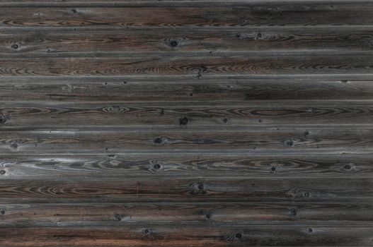 Old vintage wooden wall with color peeling paint for background.