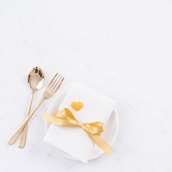 Valentine's Day meal design concept - Romantic plate dish set isolated on marble white background for restaurant holiday celebration promo, top view, flat lay.