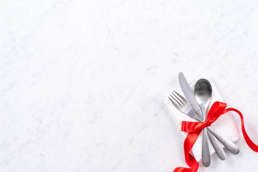 Valentine's Day meal design concept - Romantic plate dish set isolated on marble white background for restaurant holiday celebration promo, top view, flat lay.