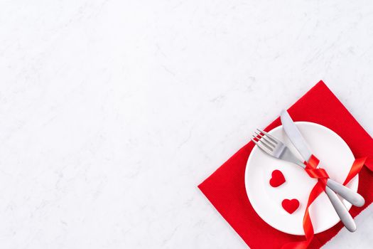 Valentine's Day meal design concept - Romantic plate dish set isolated on marble white background for restaurant holiday celebration promo, top view, flat lay.