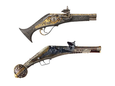 antique, vintage handguns from the 17th century. isolated background