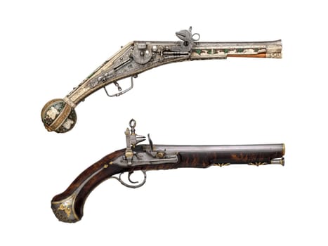 antique, vintage handguns from the 17th century. isolated background