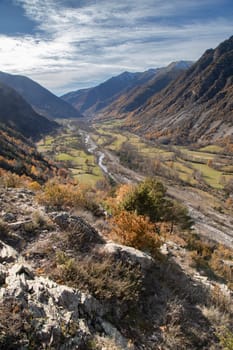 Amazing landscape showing a river surrounded by high mountains i Vall de Boi Valley in Catalonian Pyrenees