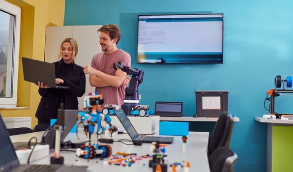 A group of colleagues working together in a robotics laboratory, focusing on the intricate fields of robotics and 3D printing. Showcase their dedication to innovation, as they engage in research, development, engineering, and precision work.