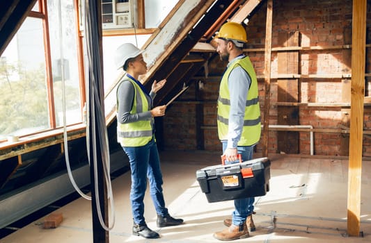 Construction, teamwork and planning with an engineer and designer working together on a building site. Meeting, strategy and engineering with a construction worker team talking about a project.