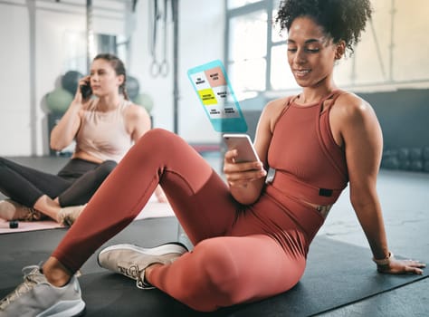 Fitness, phone or black woman on social media at gym relaxing on a break after workout. Girl, overlay or healthy sports athlete resting, scrolling on app after training with alert or notification.
