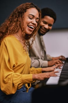 Friends, musicians and playing piano in studio album recording, night learning or education coaching for label industry. Smile, happy and singer woman with pianist instrument for radio collaboration.