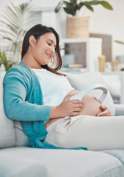Pregnant, mother and headphones on stomach for baby to listen to music for relax and growth. Musical audio, headset and pregnancy with a woman playing songs or the radio for her unborn child.