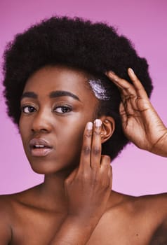 Black woman, hair portrait and conditioner for afro, haircare and ethnic texture on pink studio background. African model, haircare cream and lotion product for scalp maintenance, skincare and beauty.