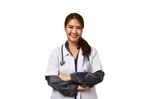 Portrait of smiling female doctor dressed in white coat with stethoscope isolated on white background. Healthcare concept.