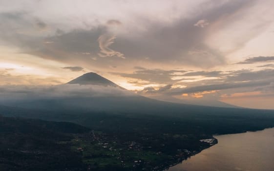 Sunset aerial view of Agung volcano in Bali, Indonesia.