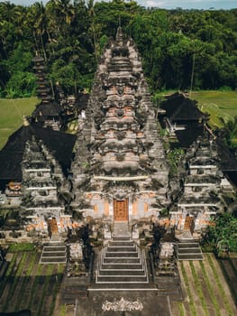 Aerial view of beautiful complex traditional Hinduism stone balinese temple. Holy asian pura architecture, Indonesia