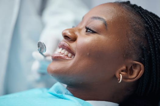 Face, dental and black woman at dentist, orthodontics tools with teeth cleaning and smile for healthcare check. Health for mouth, teeth whitening and tooth decay with oral hygienist and gum disease.