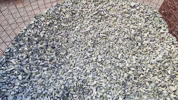 Gravel texture. Fine gray stone gravel. Natural textural background. Copy space, pattern