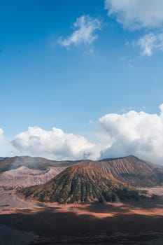 Landscape view of bromo volcano with cloudy sky. Misty bromo tengger Semeru National Park