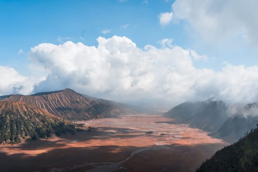 Landscape view of bromo volcano with cloudy sky. Misty bromo tengger Semeru National Park