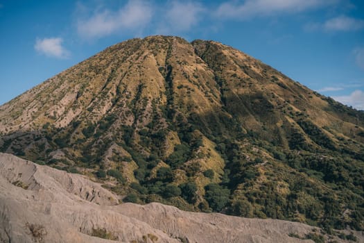 Mount Bromo desert view with blue sky background. Semeru Tengger National Park in Java