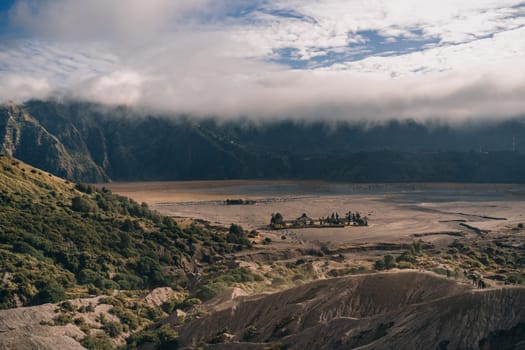 Majestic landscape view of foggy Mount Bromo volcano. Morning mist in Semeru National Park