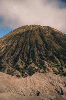 Mount Bromo desert view with blue sky background. Semeru Tengger National Park in Java