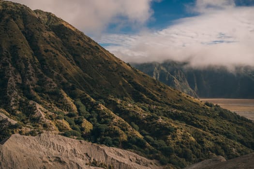 Bromo Tengger National Park in Indonesia. Semeru mountain and volcanic landscape view in fog