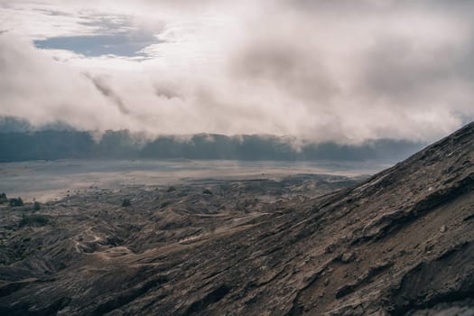 Landscape view of Bromo mount crater in fog. Semeru National Park in Indonesia volcanic reservation