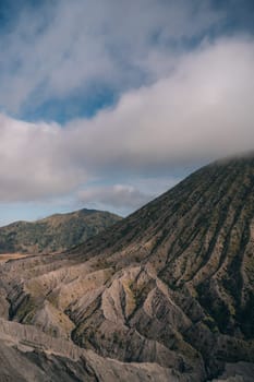 Mount Bromo desert view with blue sky background. Semeru Tengger National Park in Java