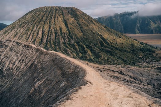 Landscape view of footpath to mount Bromo. Trekking route to top viewpoint on Bromo volcano