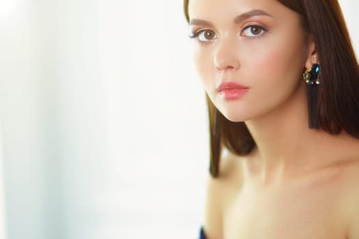 Beauty portrait of female face with natural skin.