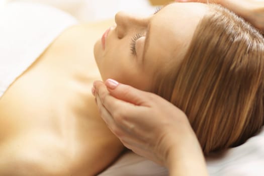 picture of beautiful woman beautiful woman in spa salon.