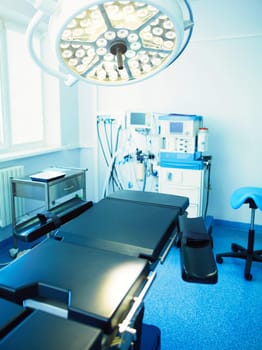 Interior of operating room in modern clinic.