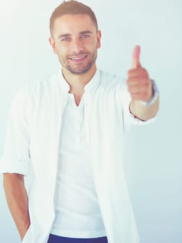 Young business man standing isolated on white background